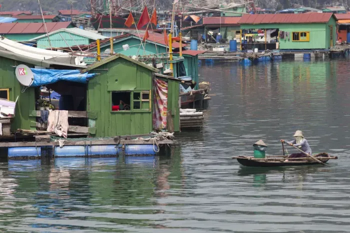 Framed Print : Floating fishing village off Cat Ba Island, Halong Bay, Vietnam Framed Print : Floating fishing village off Cat Ba Island, Halong Bay, Vietnam