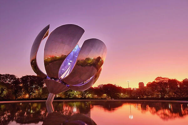 The 'Floralis Generica' monument at twilight, Recoleta, Buenos Aires, Argentina. It was created in 2002 by artist Eduardo Catalano