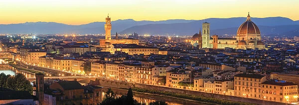 Florence, Tuscany, Italy. Sunset view over the Arno river, Ponte Vecchio, the Duomo