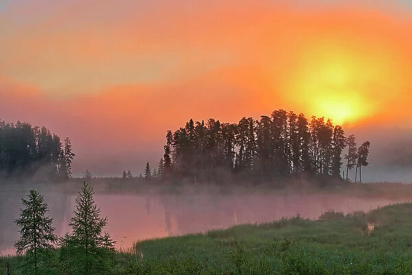 Fog at sunrise on Isabel Lake Kenora, Ontario, Canada