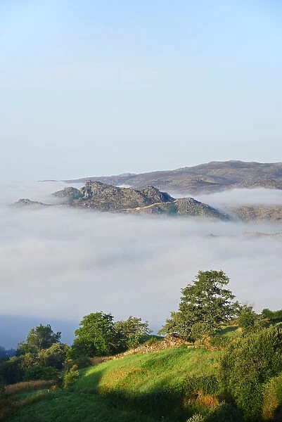 The fog surrounding the old and traditional village of Pitoes das Junias