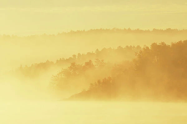 Fog along the Vermillion River at sunrise Whitefish, Ontario, Canada