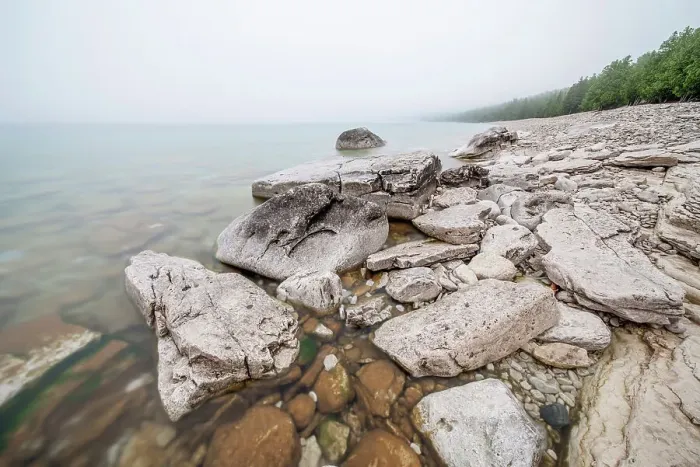 Framed Print : A foggy morning at Halfway Log Dump on Georgian Bay in Bruce Peninsula National Park, Ontario, Canada Framed Print : A foggy morning at Halfway Log Dump on Georgian Bay in Bruce Peninsula National Park, Ontario, Canada