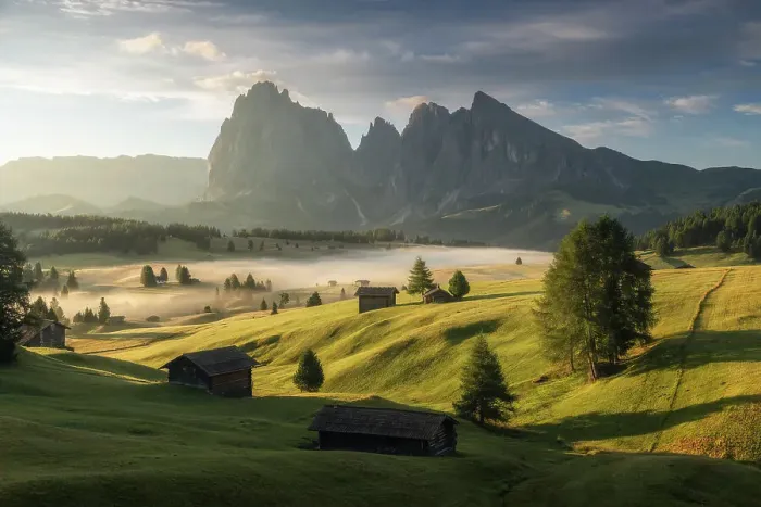 Framed Print : A foggy sunrise, Alpe di Siusi (Seiser Alm), with the Sassolungo and Sassopiatto and wooden cabins. Dolomites, Italy Framed Print : A foggy sunrise, Alpe di Siusi (Seiser Alm), with the Sassolungo and Sassopiatto and wooden cabins. Dolomites, Italy