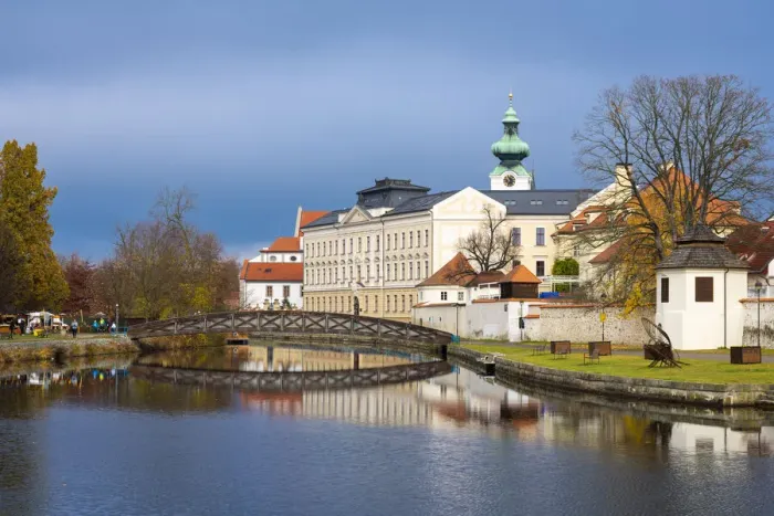 Framed Print : Footbridge over the Blind Shoulder of the Malse river named Muselak and tower of Dominican Monastery, Ceske Budejovice, South Bohemian Region, Czech Republic Framed Print : Footbridge over the Blind Shoulder of the Malse river named Muselak and tower of Dominican Monastery, Ceske Budejovice, South Bohemian Region, Czech Republic
