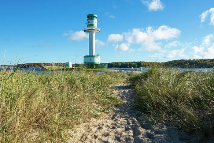 Framed Print : Footpath amidst grass against Friedrichsort lighthouse, Kiel, Schleswig-Holstein, Germany Framed Print : Footpath amidst grass against Friedrichsort lighthouse, Kiel, Schleswig-Holstein, Germany