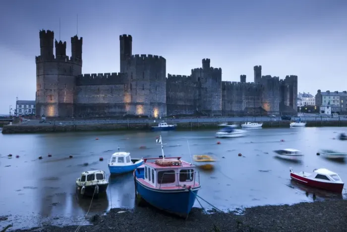 Framed Print : Foreboding evening skies above the immense Caernarfon Castle, Caernarfon, Gwynedd, North Wales Framed Print : Foreboding evening skies above the immense Caernarfon Castle, Caernarfon, Gwynedd, North Wales