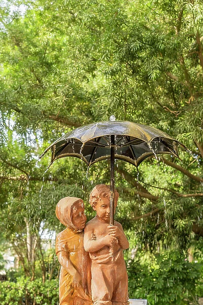Fountain los Ninos del Paraguas in Parque Genoves, Cadiz, Andalusia, Spain