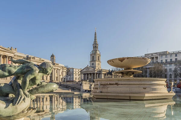 Fountain and St Martins in the Field church, Trafalgar Square, London, England