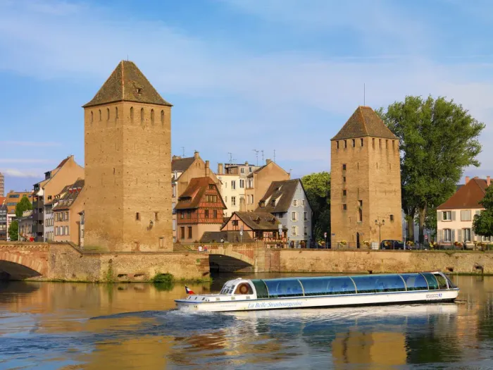 Framed Print : France, Alsace, Strasbourg, Pont couverts, Tourist boat Framed Print : France, Alsace, Strasbourg, Pont couverts, Tourist boat