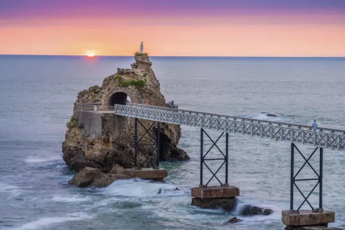 Framed Print : France, Aquitaine, Pyrenees Atlantiques, Biarritz. Rocher de la Vierge at sunset