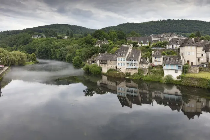 Framed Print : France, Correze, Argentat, The old town reflected in the Dordogne river with some Framed Print : France, Correze, Argentat, The old town reflected in the Dordogne river with some