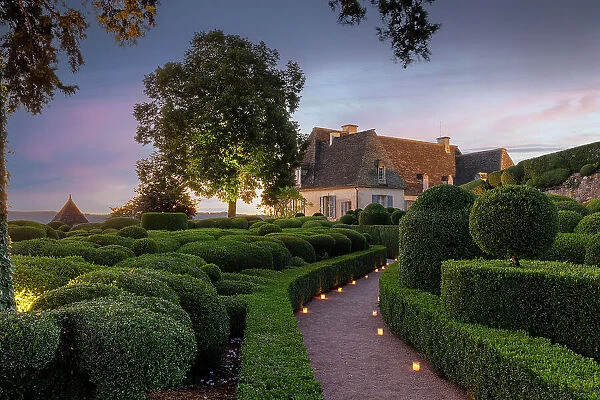 France, Dordogne, Perigord Noir, Dordogne valley, Vezac, Marqueyssac castle & boxwood gardens illuminated by candles at sunset