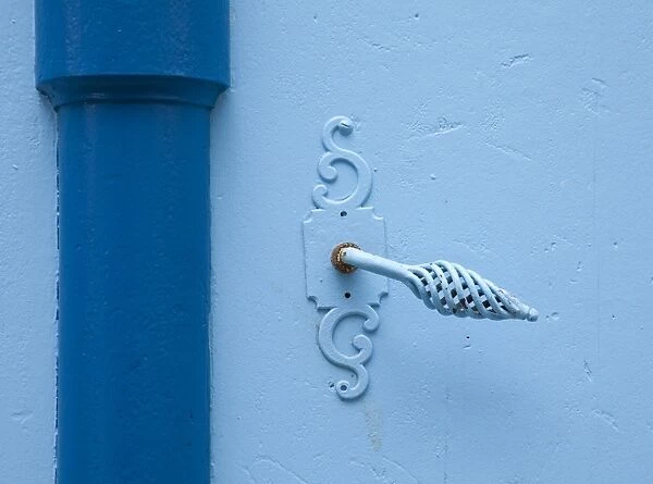 France, Haute-Garonne, Revel. Old door handle and drain pipe, Revel