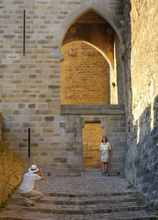 Framed Print : France, Languedoc, Carcassonne, Man photographing woman (MR) Framed Print : France, Languedoc, Carcassonne, Man photographing woman (MR)