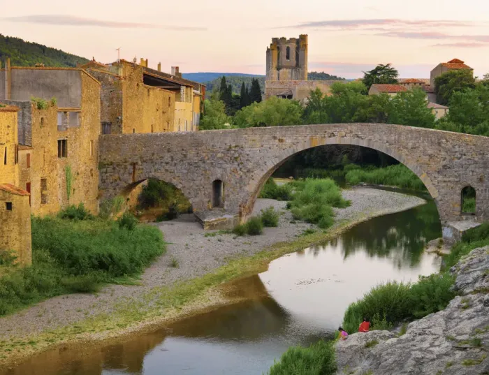Framed Print : France, Languedoc, Lagrasse, woman and girl siiting by river (MR) Framed Print : France, Languedoc, Lagrasse, woman and girl siiting by river (MR)