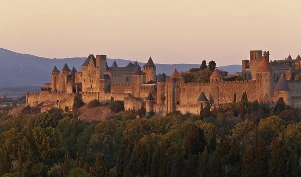 France, Languedoc-Rousillon, Carcassonne. The fortifications of Carcassonne at dusk