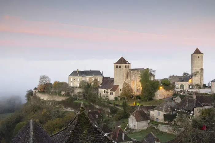 Framed Print : France, Midi-Pyrenees, Lot, Montvalent village illuminated before sunrise Framed Print : France, Midi-Pyrenees, Lot, Montvalent village illuminated before sunrise