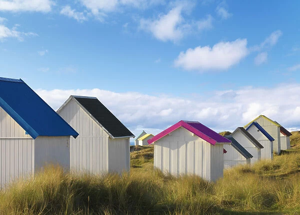 France, Normandy, Gouville Sur Mer, colourful beach huts