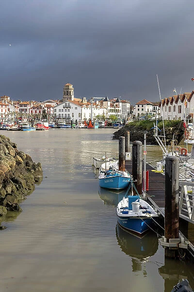 France, Nouvelle-Aquitaine, Pyrenees-Atlantiques, Pays Basque, Basque Country, Saint- Jean-de-Luz, small fishing boats in front of the historical centre