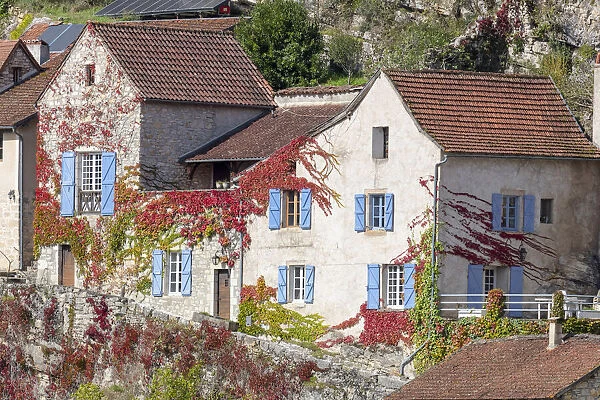 France, Occitanie, Lot, colourful buildings at Larnagol on the river Lot