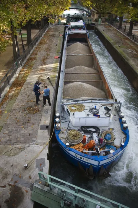 Framed Print : France, Paris, Canal St-Martin, barge in canal locks by the Quai de Jemmapes Framed Print : France, Paris, Canal St-Martin, barge in canal locks by the Quai de Jemmapes