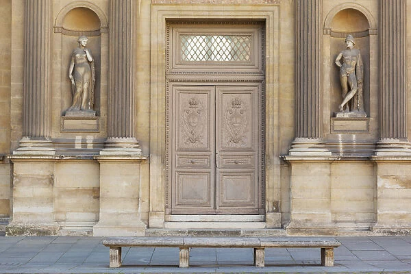 France, Paris, The Louvre, bench infront of doorway