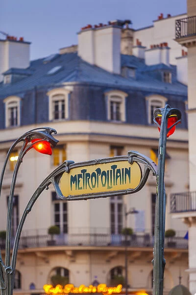 France, Paris, metro sign at dusk