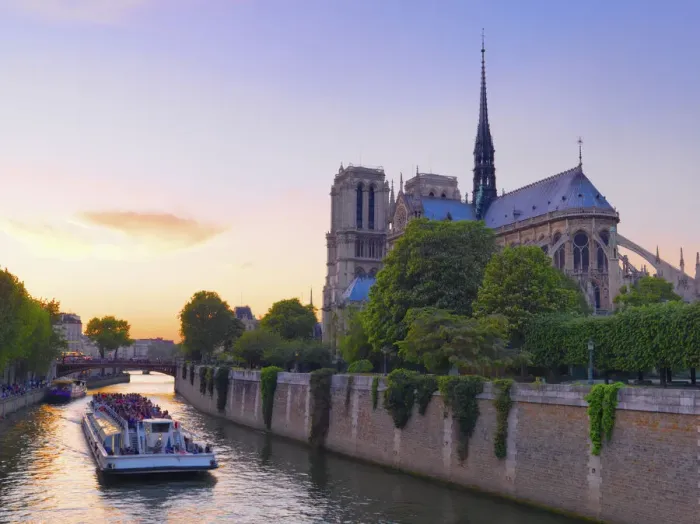 Framed Print : France, Paris, Notre Dame Cathedral, Torboat on River Seine at dusk Framed Print : France, Paris, Notre Dame Cathedral, Torboat on River Seine at dusk