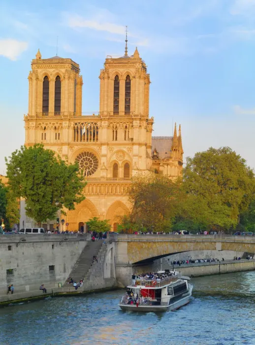 Framed Print : France, Paris, Notre Dame Cathedral and tourist boat on River Seine at sunset Framed Print : France, Paris, Notre Dame Cathedral and tourist boat on River Seine at sunset