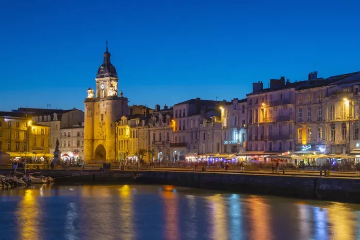 Framed Print : France, Poitou Charentes, La Rochelle, Old Harbour, Porte de La Grosse Horloge at dusk Framed Print : France, Poitou Charentes, La Rochelle, Old Harbour, Porte de La Grosse Horloge at dusk