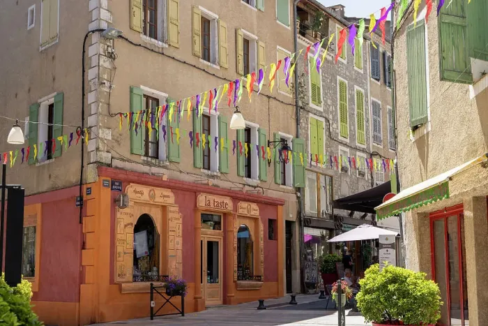 Framed Print : France, Provence-Alpes-Cote d'Azur, Sisteron, a colourful street and shop fronts in Sisteron town Framed Print : France, Provence-Alpes-Cote d'Azur, Sisteron, a colourful street and shop fronts in Sisteron town