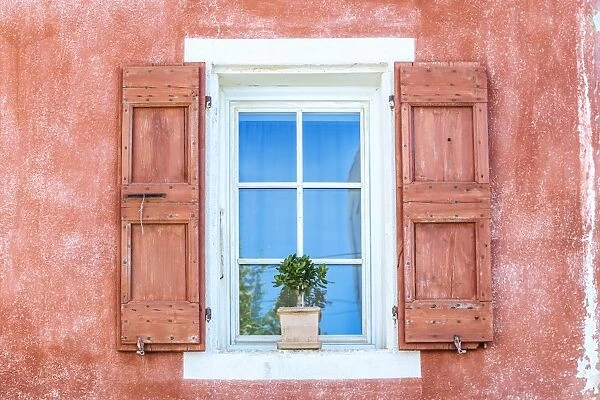 France, Provence Alps Cote d Azur, Vaucluse, Banon. Detail of a window in the old village