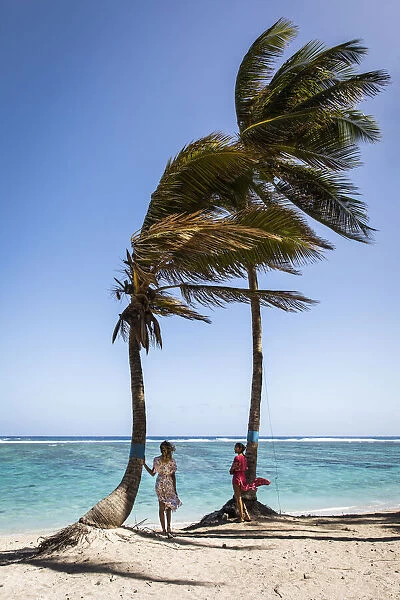 France, Reunion Island, La-Saline-les-Bains, Two girls on the Plage de la Saline