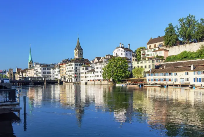 Framed Print : Fraumunster church, St Peter church on Limmat River, Zurich, Switzerland Framed Print : Fraumunster church, St Peter church on Limmat River, Zurich, Switzerland