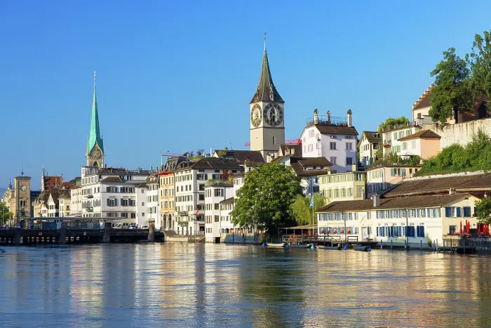 Framed Print : Fraumunster church, St Peter church on Limmat River, Zurich, Switzerland Framed Print : Fraumunster church, St Peter church on Limmat River, Zurich, Switzerland
