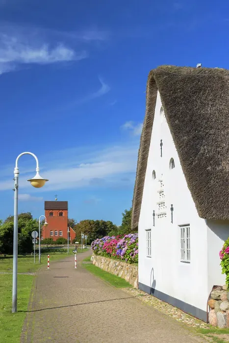 Framed Print : Frisian Church (Friesenkapelle) and traditional thatched house, Wenningstedt, Sylt, Schleswig Holstein, Germany Framed Print : Frisian Church (Friesenkapelle) and traditional thatched house, Wenningstedt, Sylt, Schleswig Holstein, Germany