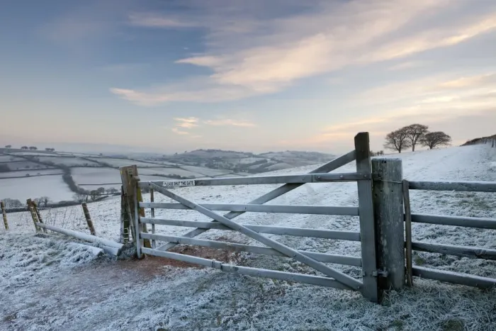 Framed Print : Frost covered wooden gate and field, Raddon Hills, Devon, England. Winter Framed Print : Frost covered wooden gate and field, Raddon Hills, Devon, England. Winter