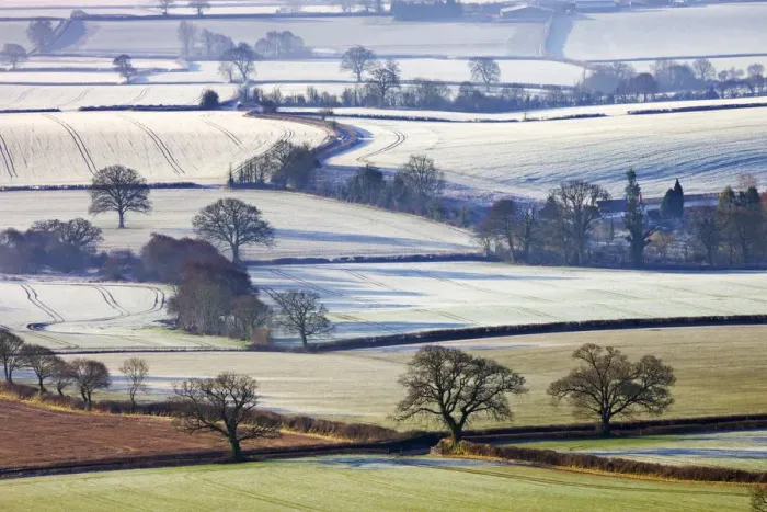 Framed Print : Frosted winter fields near Shobrooke, Devon, England. Winter (March) 2010