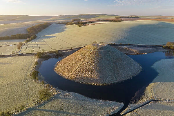 Frosty morning at Silbury Hill in Wiltshire, England. Winter (February) 2023