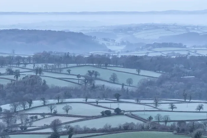 Framed Print : Frosty rolling countryside near Sourton, Devon, England. Winter (January) 2019