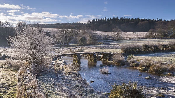 Frosty winter conditions at the old clapper bridge at Postbridge, Dartmoor, Devon