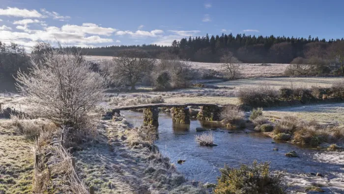 Framed Print : Frosty winter conditions at the old clapper bridge at Postbridge, Dartmoor, Devon Framed Print : Frosty winter conditions at the old clapper bridge at Postbridge, Dartmoor, Devon