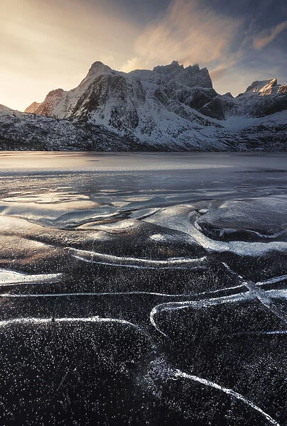 Frozen lake near Nusfjord in the Lofoten islands, Norway