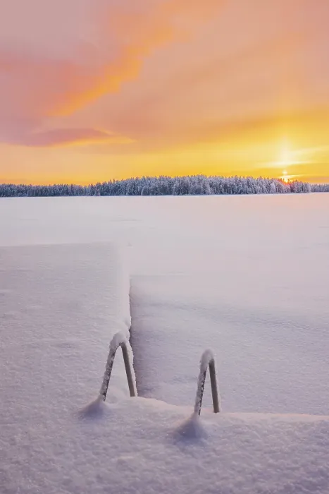 Framed Print : A frozen lake at sunset in a remote area near Ruka in finnish Lapland in winter landscape, Finland Framed Print : A frozen lake at sunset in a remote area near Ruka in finnish Lapland in winter landscape, Finland