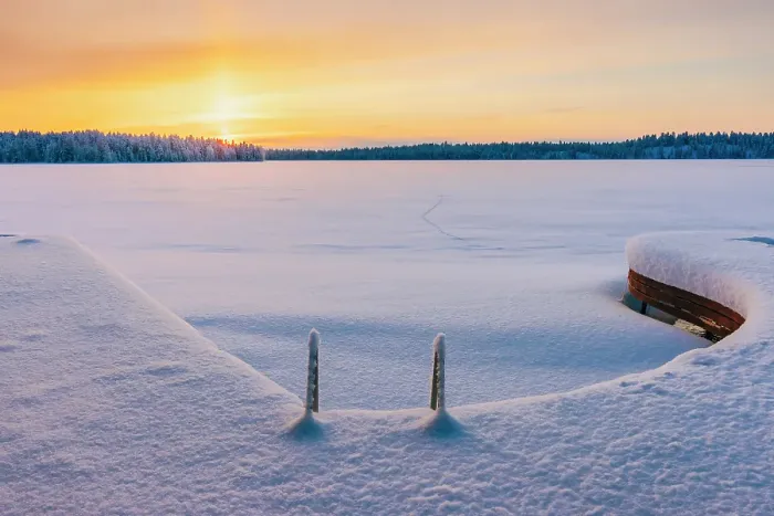 Framed Print : A frozen lake at sunset in a remote area near Ruka in finnish Lapland in winter landscape, Finland