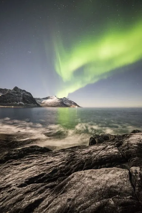 Framed Print : Frozen sea and rocky peaks illuminated by Northern Lights, Tungeneset, Senja, Tromso