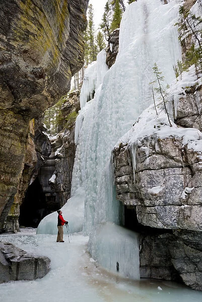 Frozen Waterfall & Man, Maligne Canyon, Jasper National Park, Alberta, Canada