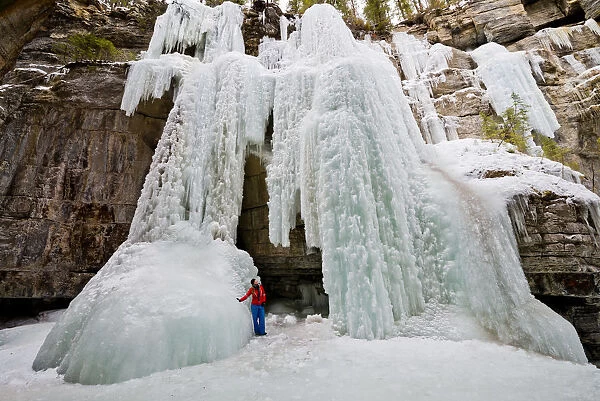Frozen Waterfall & Woman, Maligne Canyon, Jasper National Park, Alberta, Canada