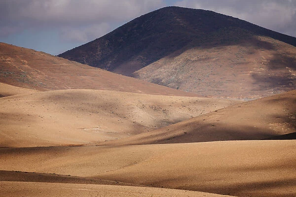 Fuerteventura inland, desertic and volcanic landscape. Canary Islands. Spain